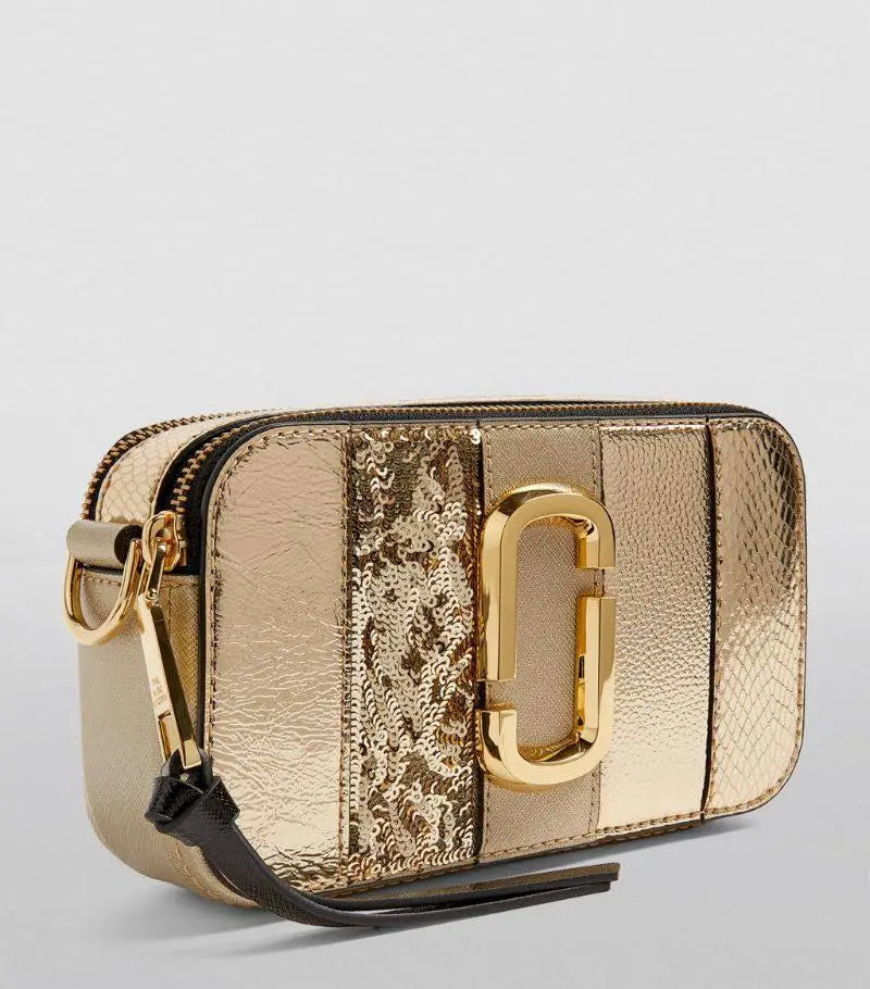 СУМКА MARC JACOBS THE SNAPSHOT METALLIC STRIPED – LIGHT GOLD MarcJacobsOutlet